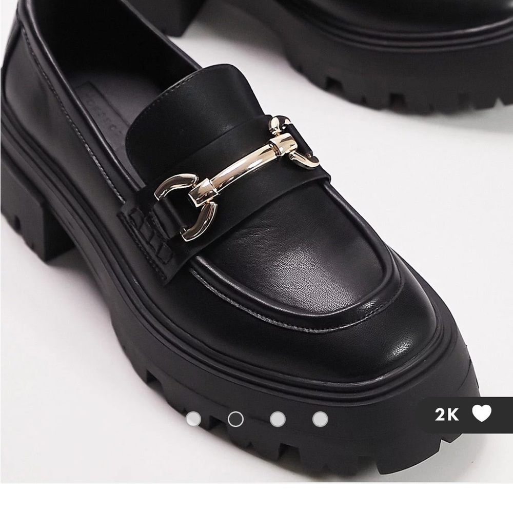 Black chunky loafers with metal detail
